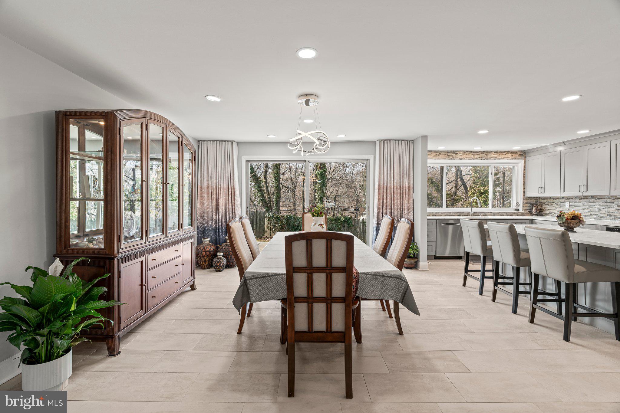 1088 Sparrow Road Jenkintown, PA 19046 - Photo 9 of 47 Kitchen open to the dining are with a sliding door