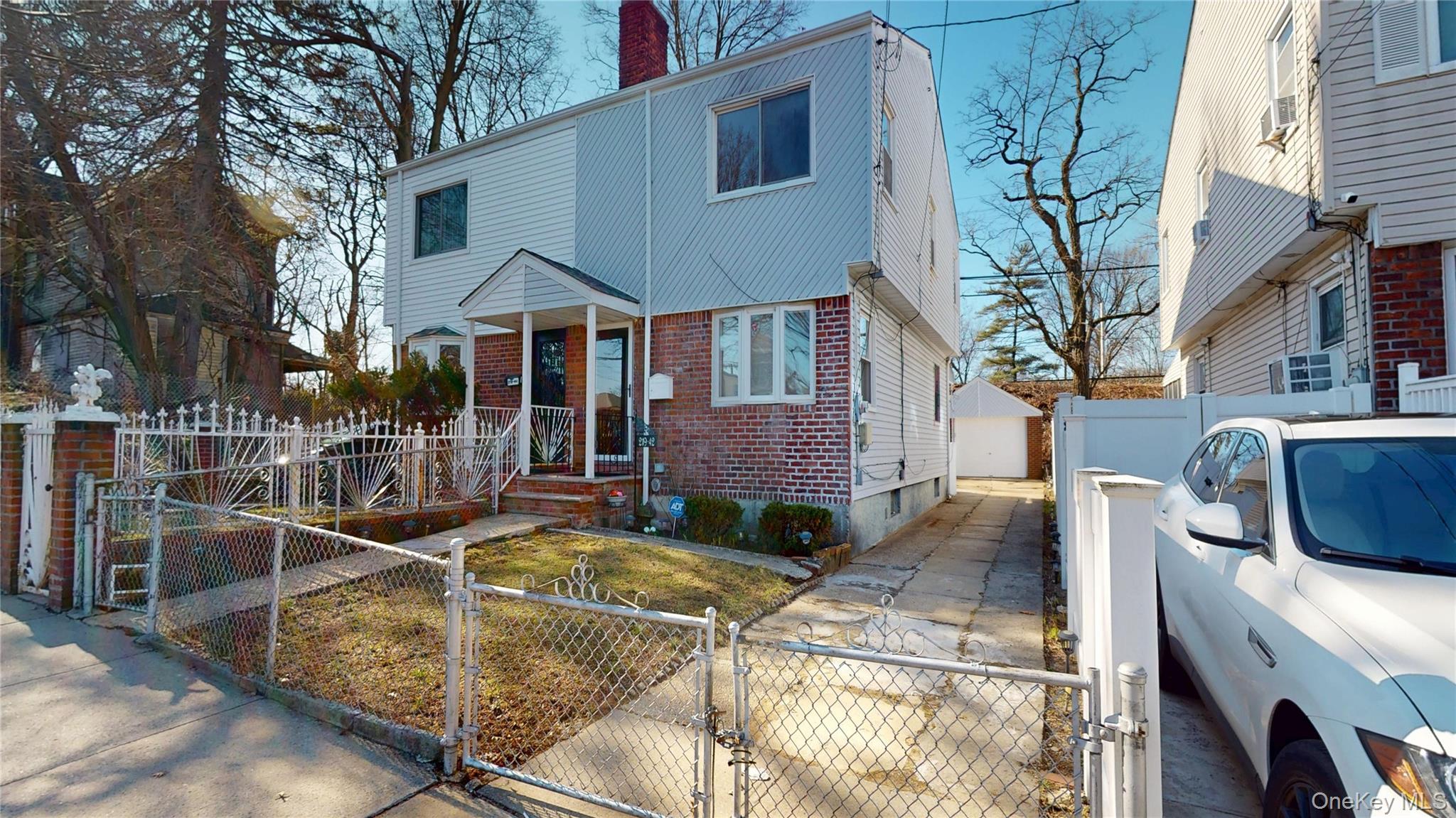 219-42 141st Road Queens, NY 11413 - Photo 13 of 23 a view of a house with backyard