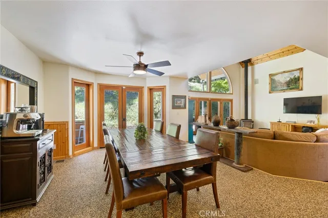 a view of a balcony with chair and table