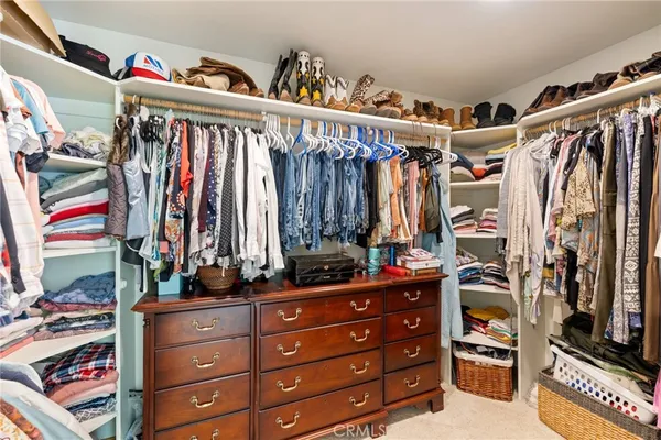 a view of a livingroom with furniture and a garage
