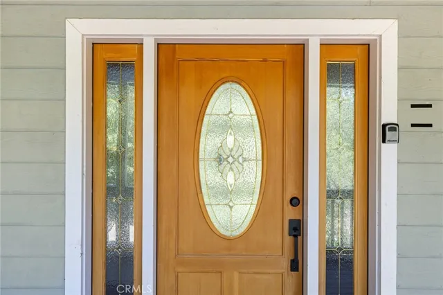 a living room with furniture or couch and a flat screen tv
