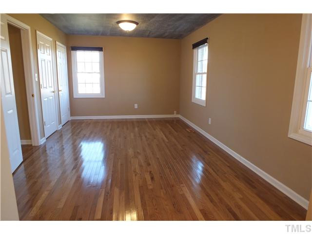 1874 Steven's Chapel Road Smithfield, NC 27577 - Photo 13 of 22 Huge Master with hardwood floors new doors, paint, lights, and bath