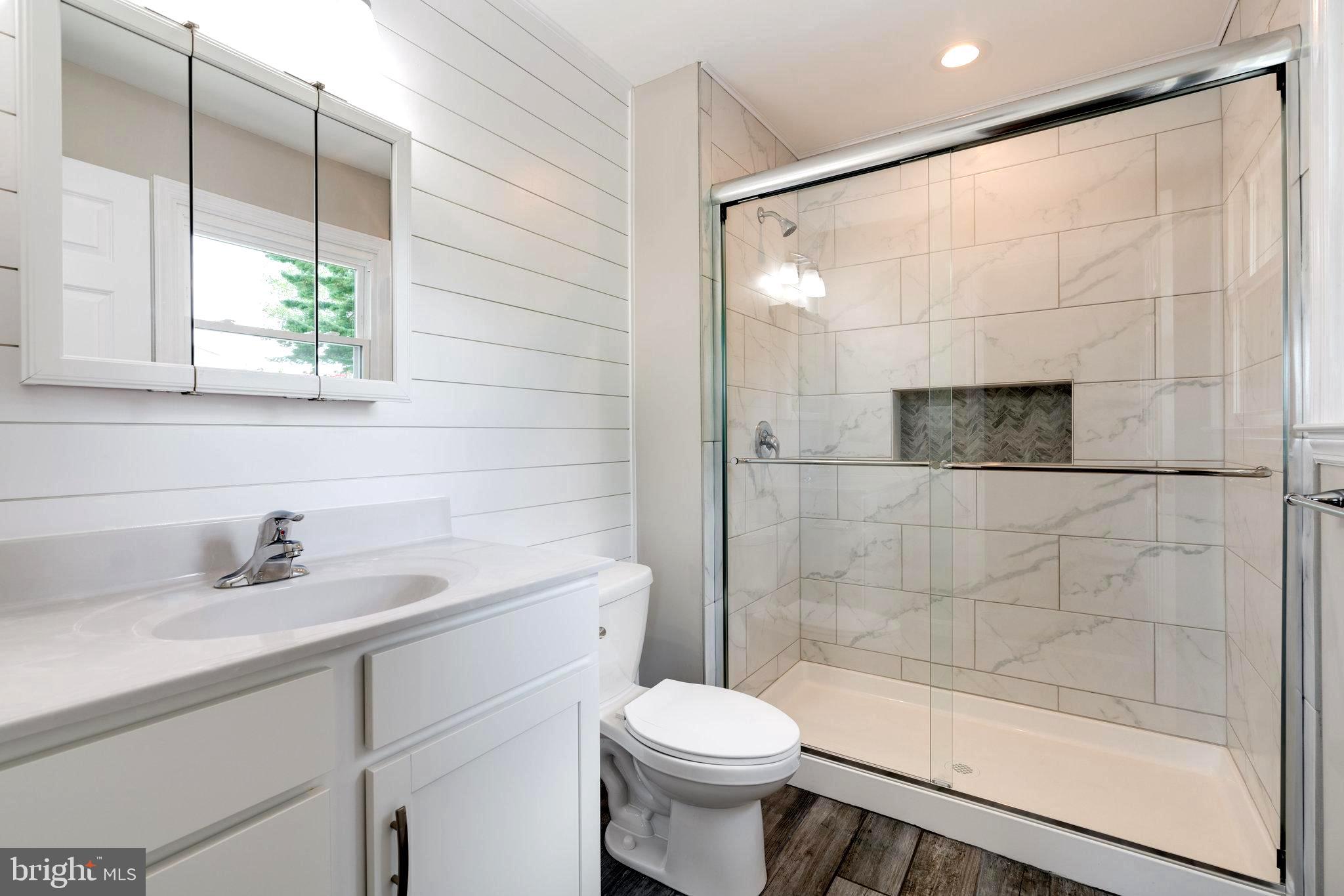 1011 Gahle Road Westminster, MD 21157 - Photo 32 of 52 Primary Bath w/Custom 3/8" Shower Door * & Tile