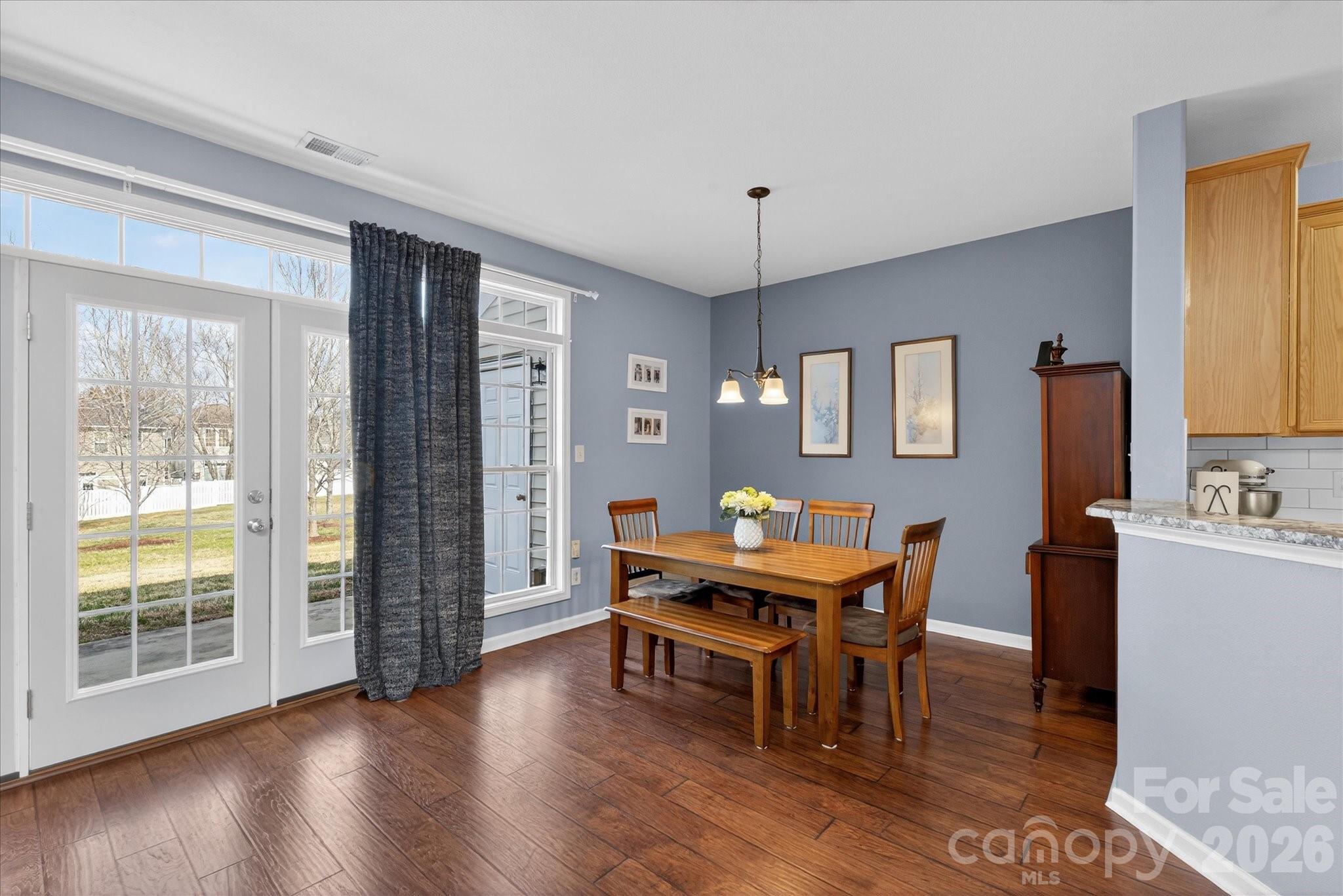 3066 Priory Ridge Drive, Unit 337 Fort Mill, SC 29707 - Photo 7 of 31 a dining room with furniture and window