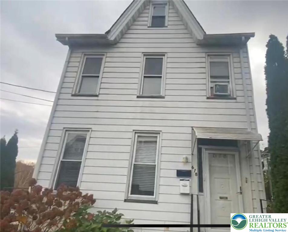 a view of a house with white door