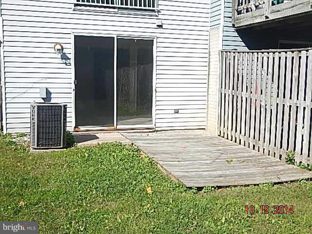 2219 Riding Crop Way Baltimore, MD 21244 - Photo 3 of 13 a view of backyard with deck