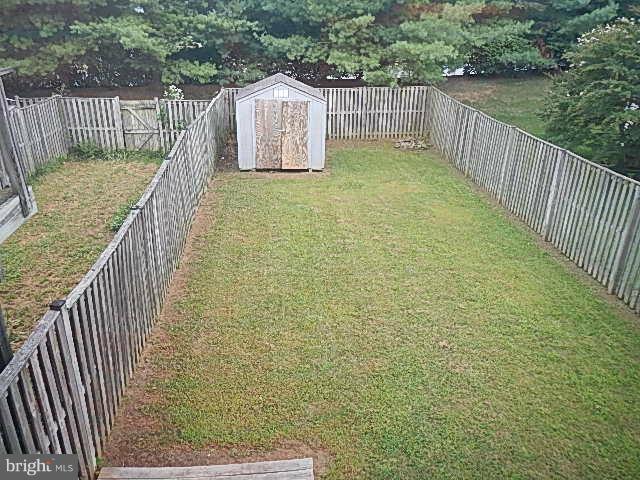 2219 Riding Crop Way Baltimore, MD 21244 - Photo 4 of 13 a view of balcony with wooden fence and trees