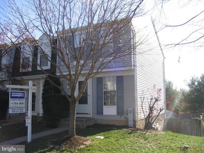 2219 Riding Crop Way Baltimore, MD 21244 - Photo 5 of 13 front view of a house with a yard