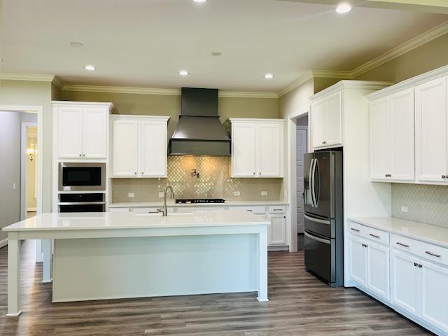 1717 Banks View Drive Raleigh, NC 27603 - Photo 13 of 33 a kitchen with stainless steel appliances a refrigerator stove and oven