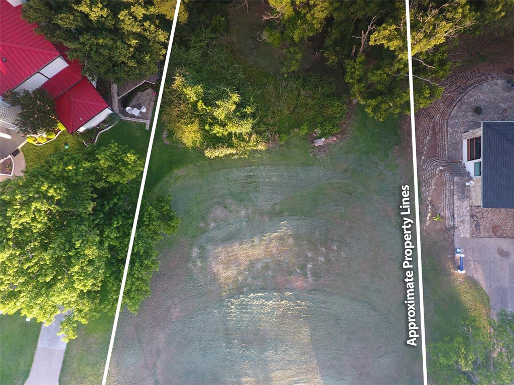 9710 Bellechase Road Granbury, TX 76049 - Photo 15 of 40 a backyard of a house with lots of green space