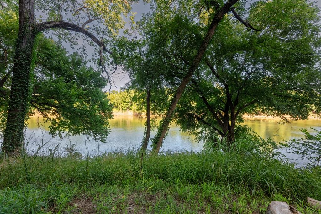 9710 Bellechase Road Granbury, TX 76049 - Photo 26 of 40 a view of lake from a yard