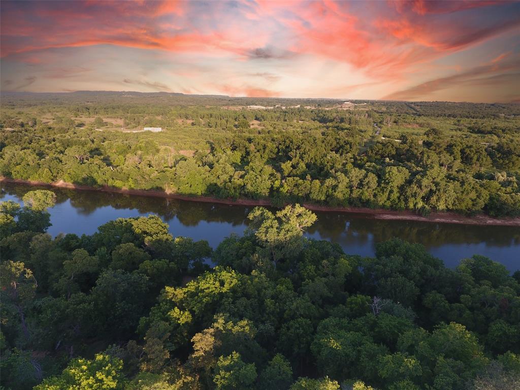 9710 Bellechase Road Granbury, TX 76049 - Photo 4 of 40 a view of lake and mountain