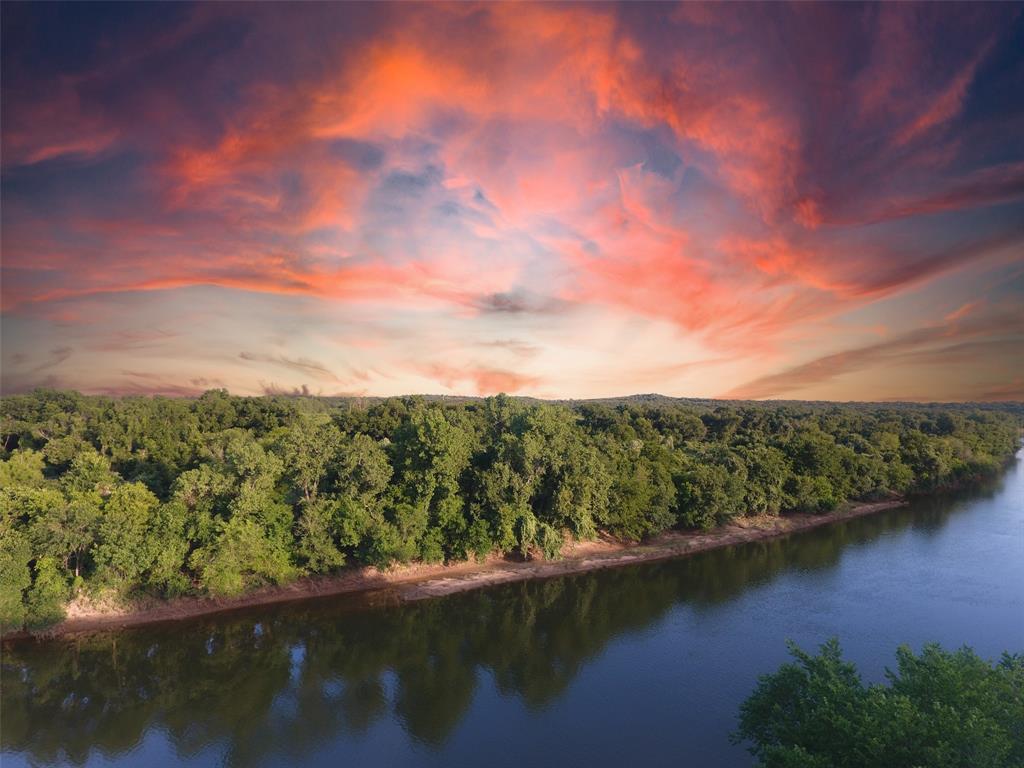 9710 Bellechase Road Granbury, TX 76049 - Photo 7 of 40 a view of a lake with a city