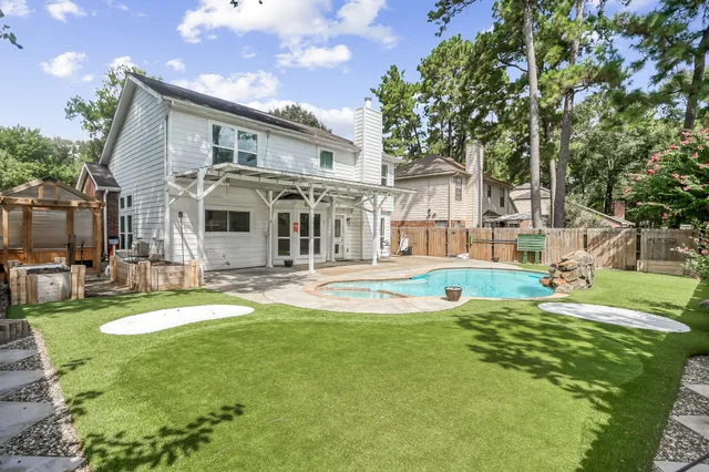 a view of a house with a swimming pool