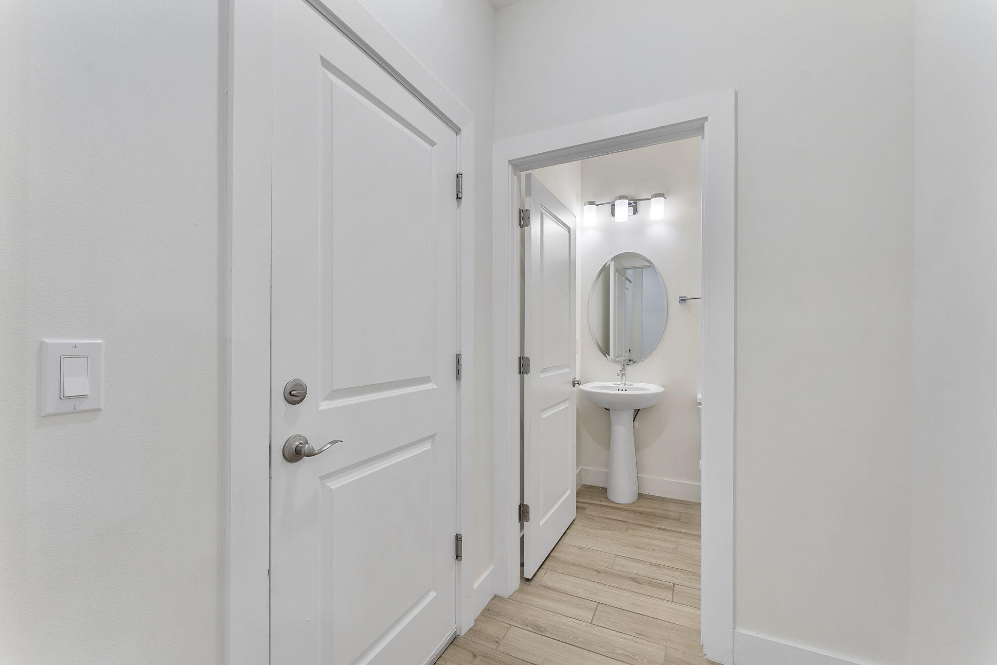 247 Preserve Trail North Stuart, FL 34994 - Photo 31 of 34 a view of a bathroom from a hallway
