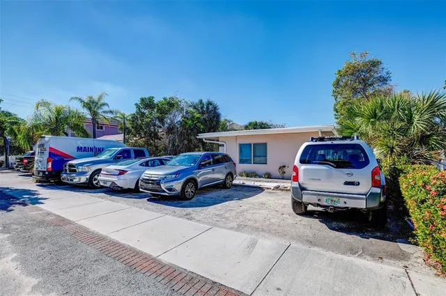 a car parked in front of a house