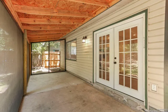a view of a large room with a large window