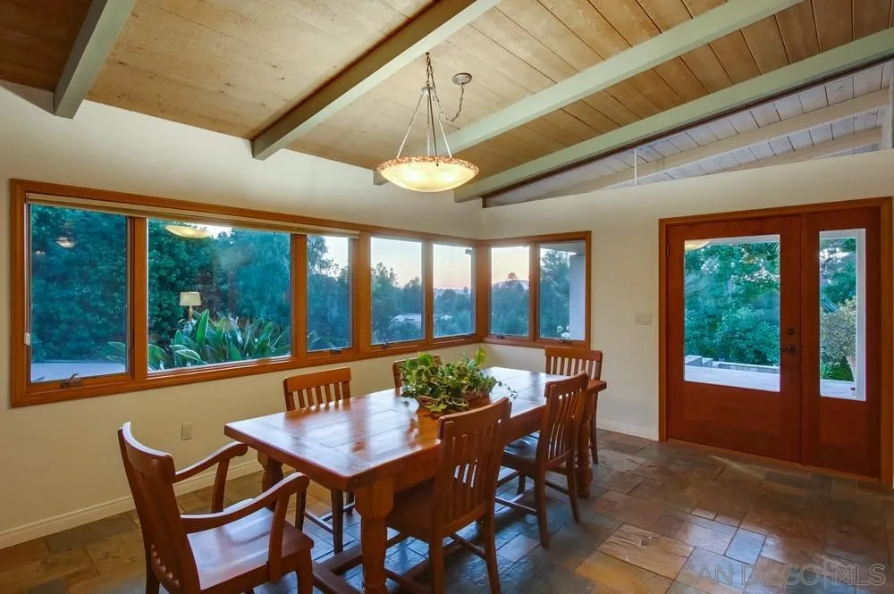13401 Stone Canyon Road Poway, CA 92064 - Photo 14 of 25 a view of a dining room with furniture window and outside view
