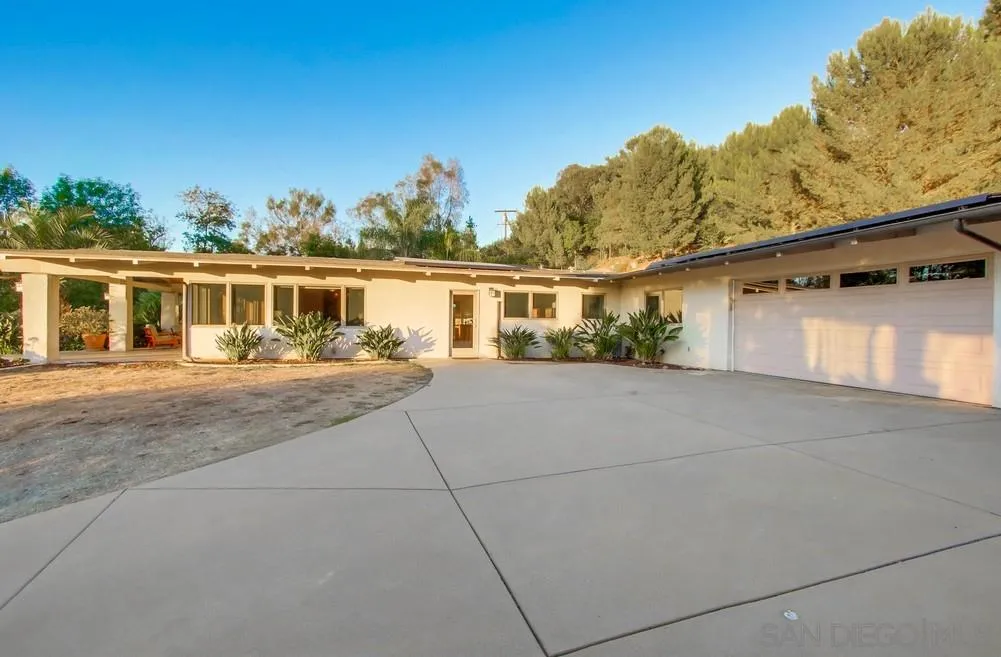 13401 Stone Canyon Road Poway, CA 92064 - Photo 24 of 25 front view of house with a yard