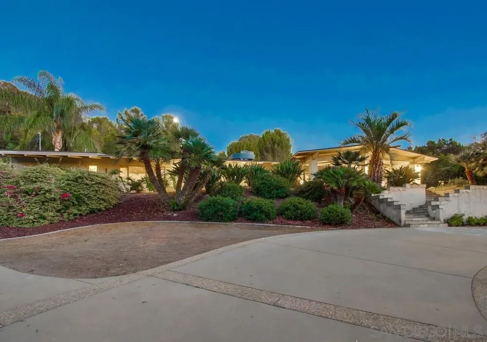13401 Stone Canyon Road Poway, CA 92064 - Photo 4 of 25 a view of a street with a building in the background