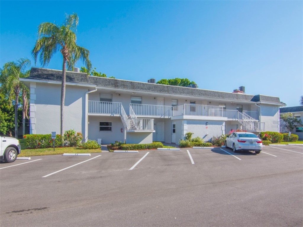 1166 6th Avenue, Unit C5 Vero Beach, FL 32960 - Photo 1 of 34 a view of street with cars