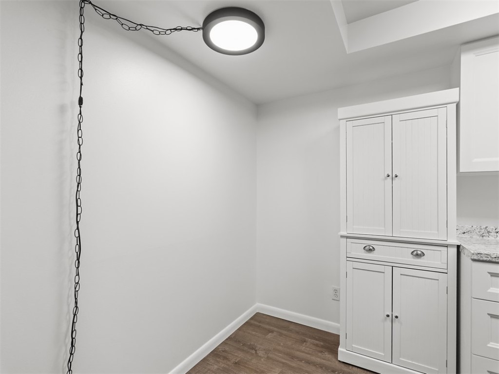 1166 6th Avenue, Unit C5 Vero Beach, FL 32960 - Photo 11 of 34 a view of a livingroom with wooden floor
