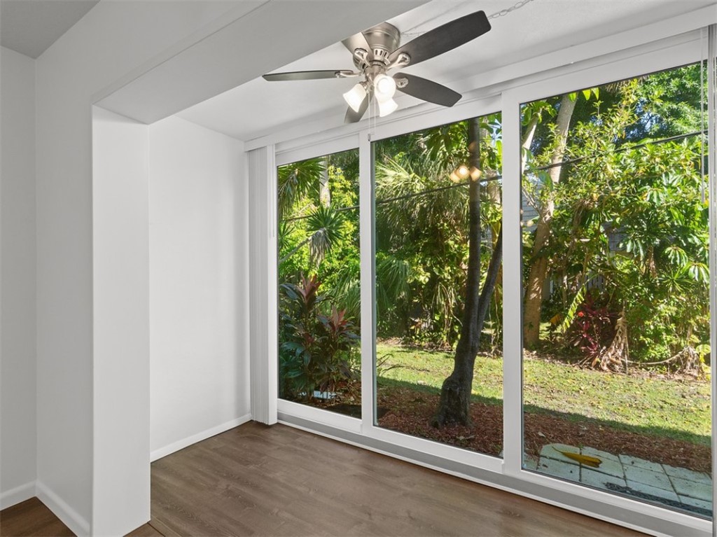 1166 6th Avenue, Unit C5 Vero Beach, FL 32960 - Photo 17 of 34 a view of an empty room with a window