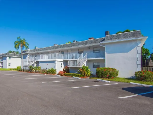 a front view of a building with yellow lighting