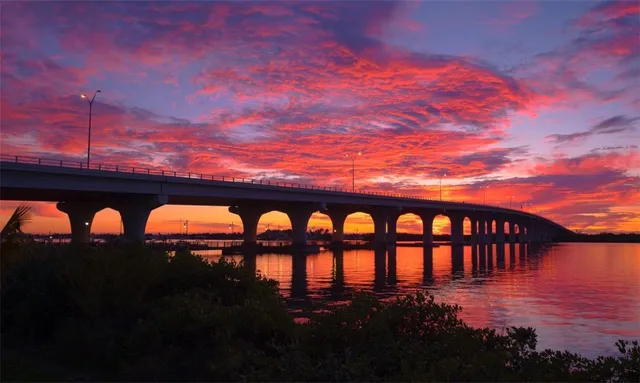 a view of swimming pool from a balcony