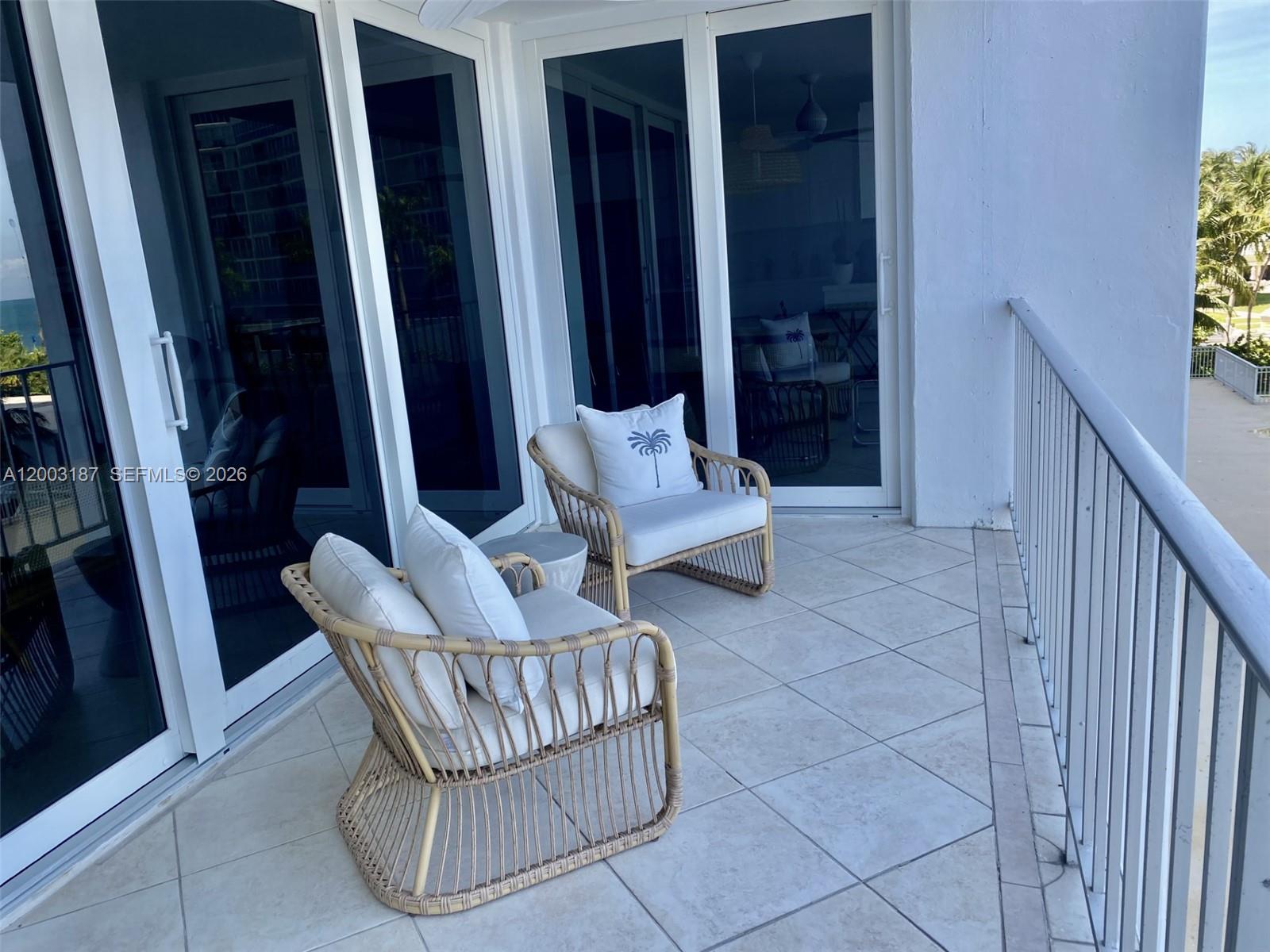 881 Ocean Drive, Unit 3E Key Biscayne, FL 33149 - Photo 4 of 15 a view of porch with seating space