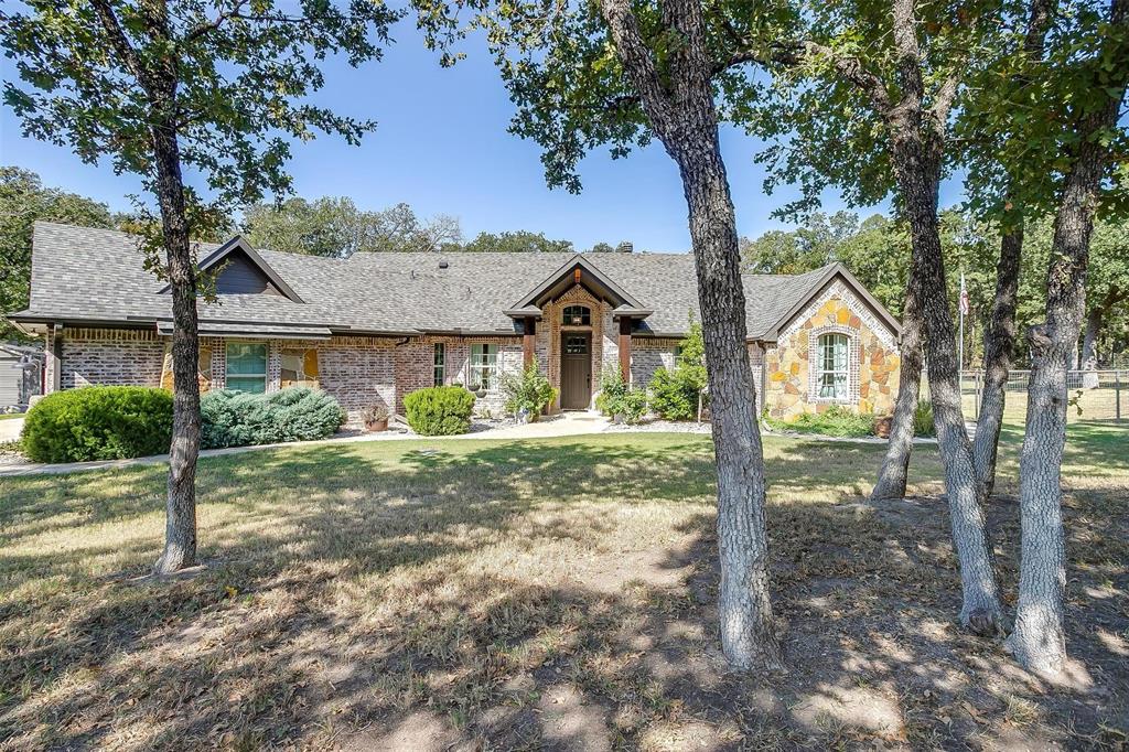 236 Rock Springs Road Weatherford, TX 76088 - Photo 1 of 1 a view of a house with yard and tree s
