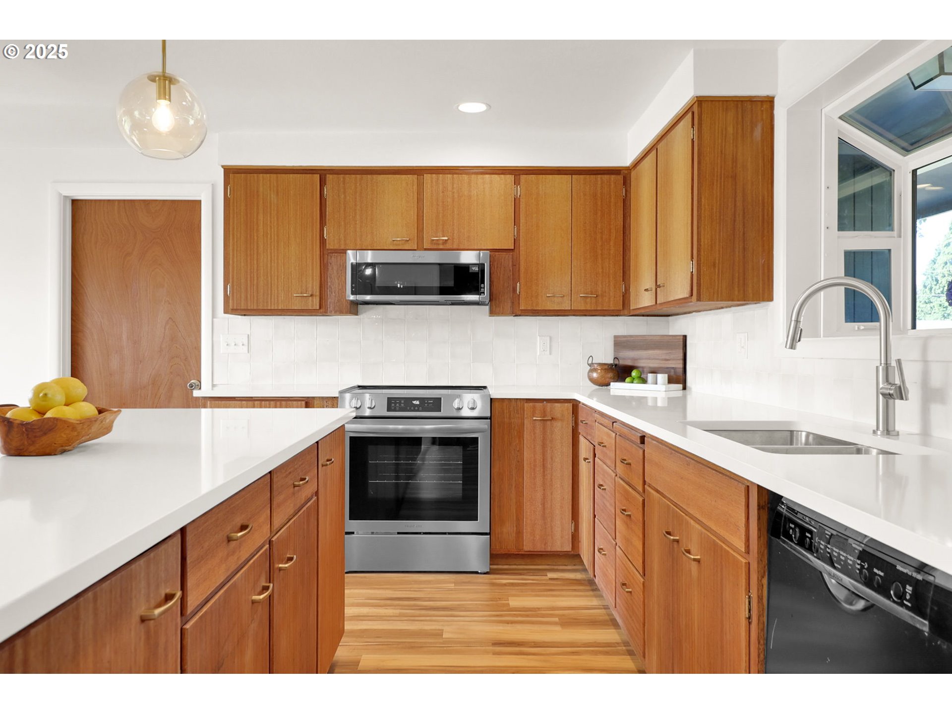 90774 Alvadore Road Junction City, OR 97448 - Photo 12 of 43 a kitchen with a sink and a stove
