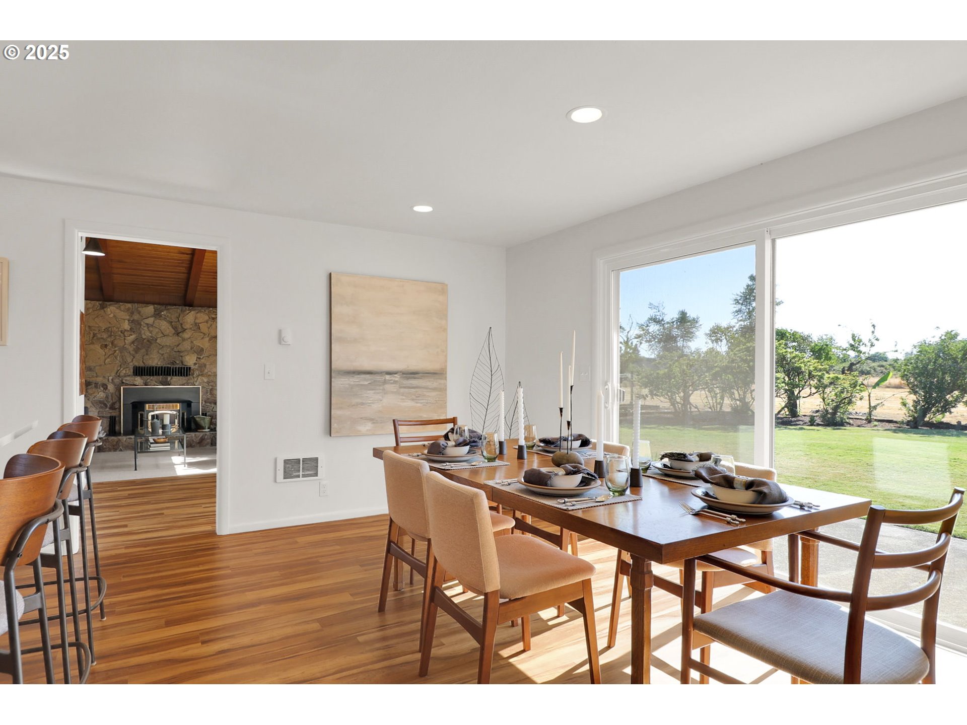 90774 Alvadore Road Junction City, OR 97448 - Photo 14 of 43 a dining room with furniture and wooden floor