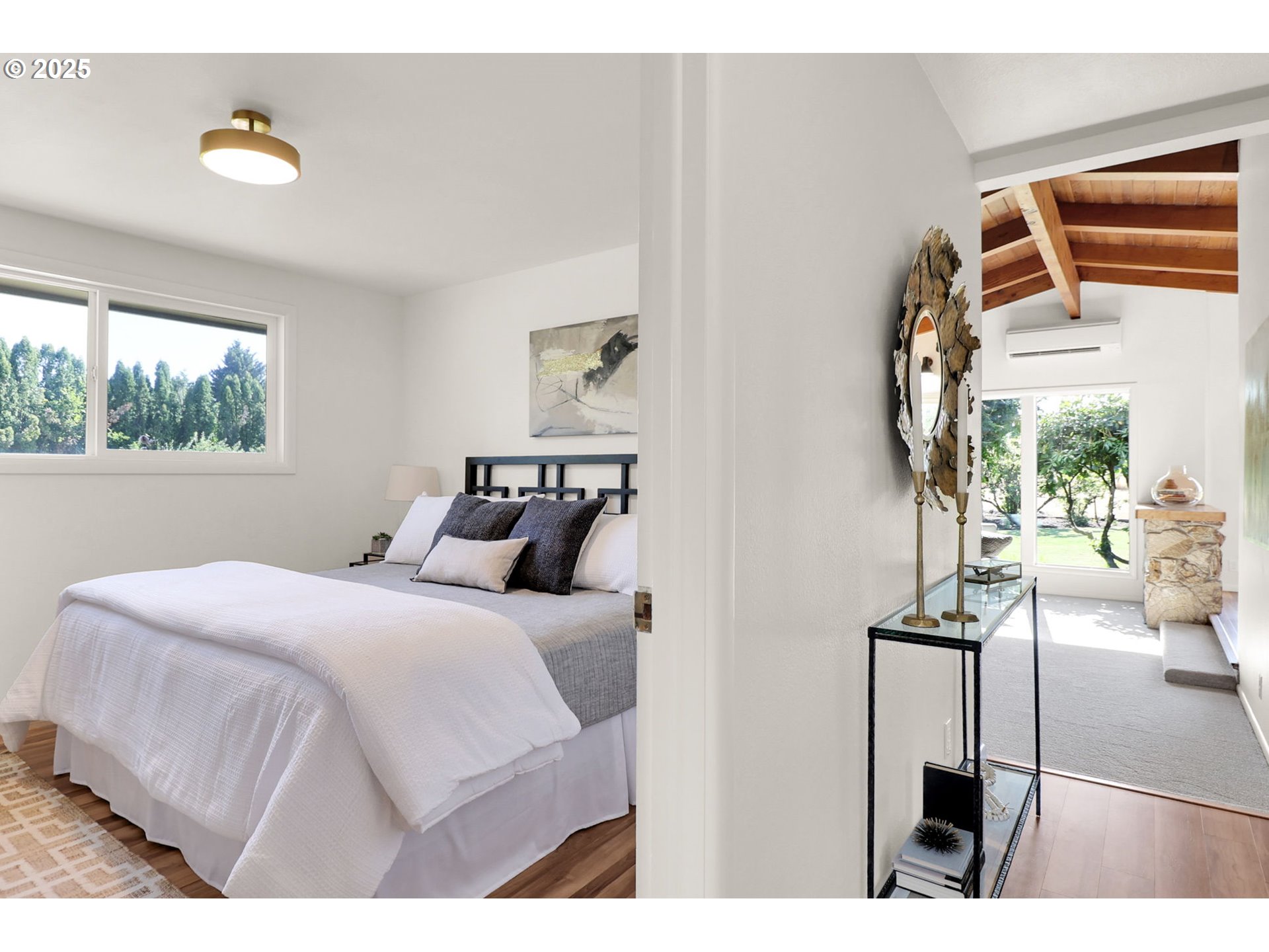 90774 Alvadore Road Junction City, OR 97448 - Photo 18 of 43 a bedroom with a bed and a painting on the wall