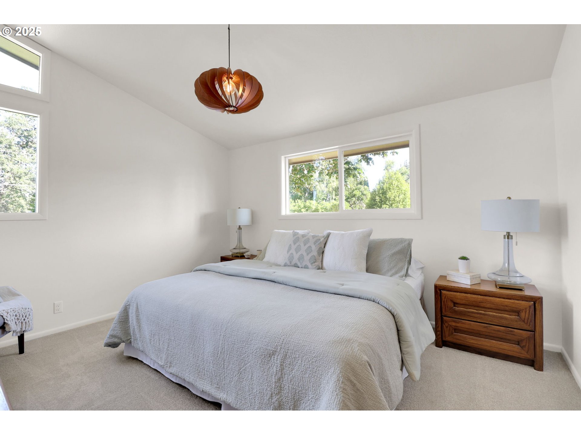 90774 Alvadore Road Junction City, OR 97448 - Photo 20 of 43 a bedroom with a bed and a window