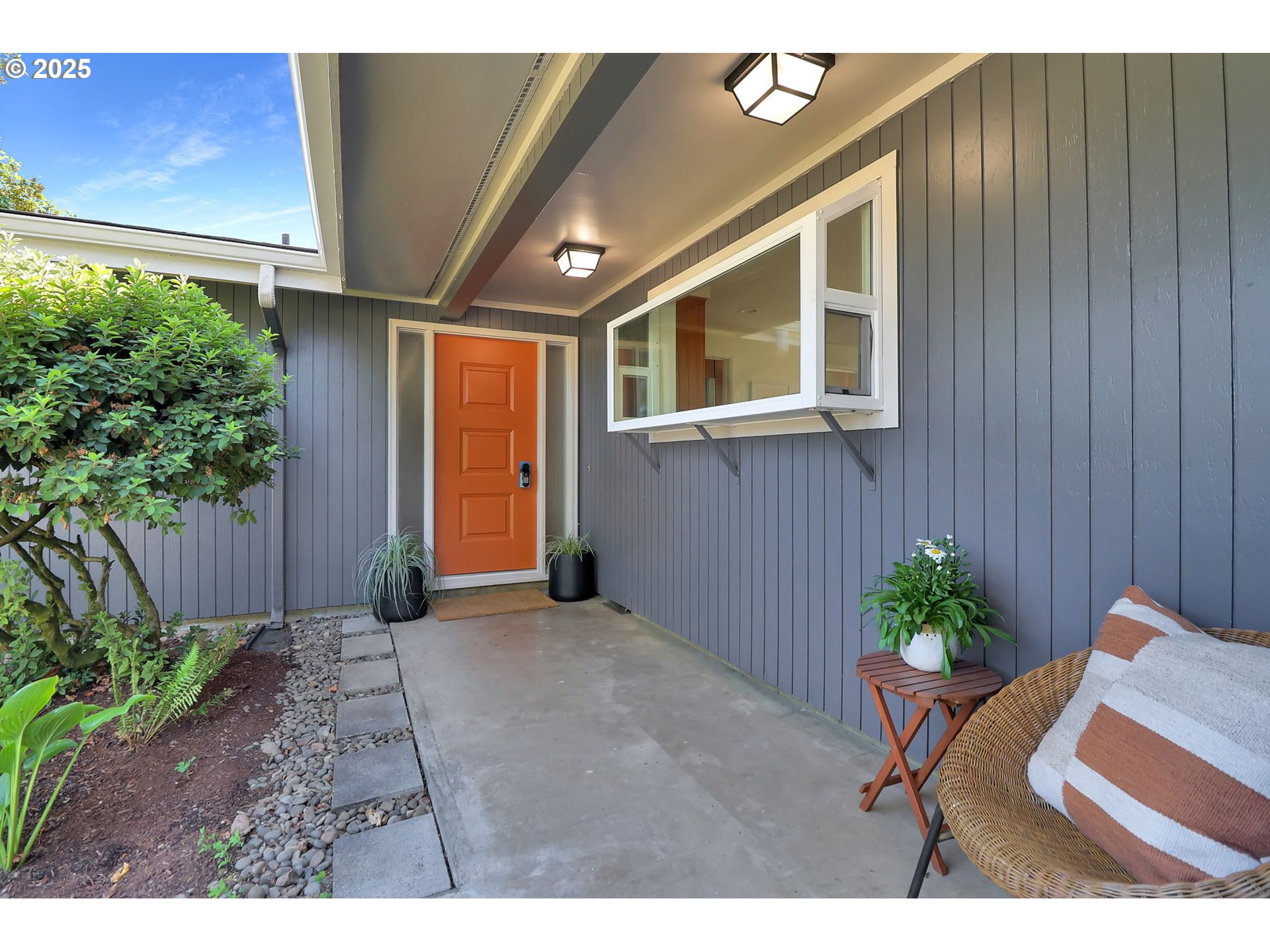 90774 Alvadore Road Junction City, OR 97448 - Photo 3 of 43 a porch with seating space