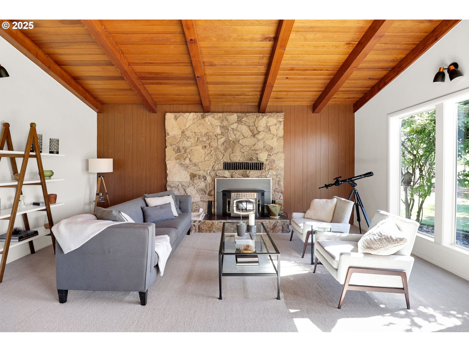 90774 Alvadore Road Junction City, OR 97448 - Photo 5 of 43 a living room with furniture a fireplace and a table