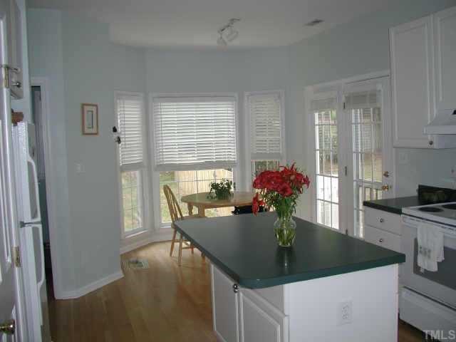 Breakfast area has beautiful bay windows!