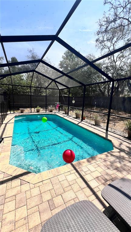 11102 Upton Street Spring Hill, FL 34608 - Photo 17 of 23 a view of a backyard of a house