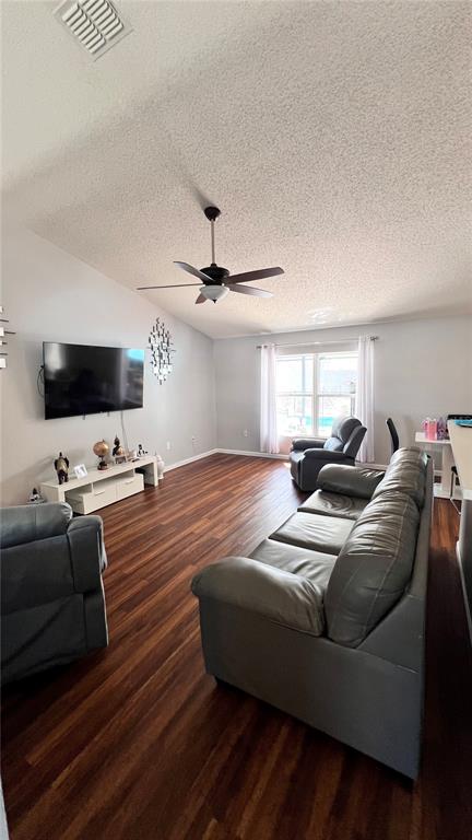 11102 Upton Street Spring Hill, FL 34608 - Photo 5 of 23 a living room with furniture and a flat screen tv