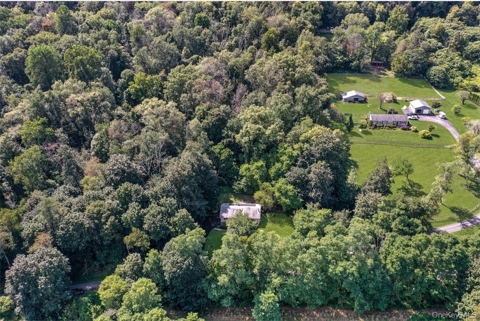 18 Stage Road Pine Island, NY 10969 - Photo 14 of 17 an aerial view of a house with a yard and lake view