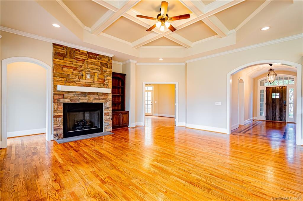 6631 Fox Ridge Circle Davidson, NC 28036 - Photo 22 of 48 a view of an empty room with fire place and a fireplace