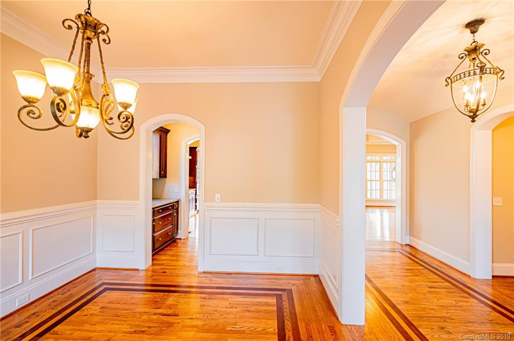 6631 Fox Ridge Circle Davidson, NC 28036 - Photo 4 of 48 a view of a room with wooden floor and windows