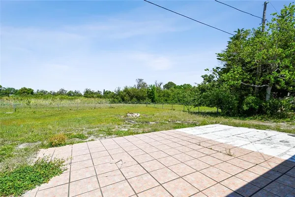 a view of lake with green space