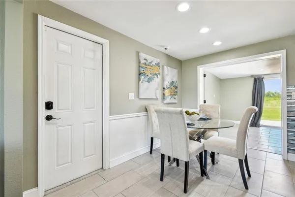 a view of a dining room with furniture