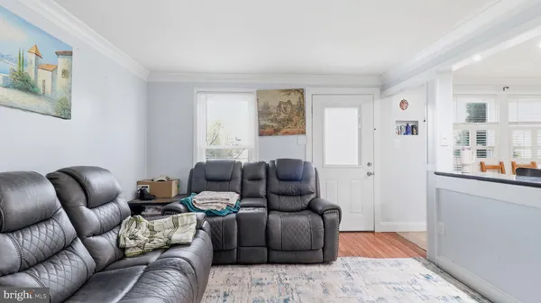 a living room with furniture and a couch