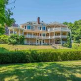 a view of a building with a yard