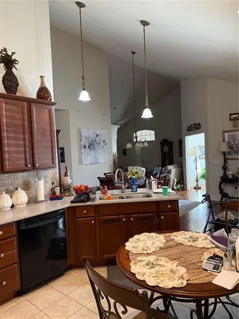 a bathroom with a sink double vanity and a mirror