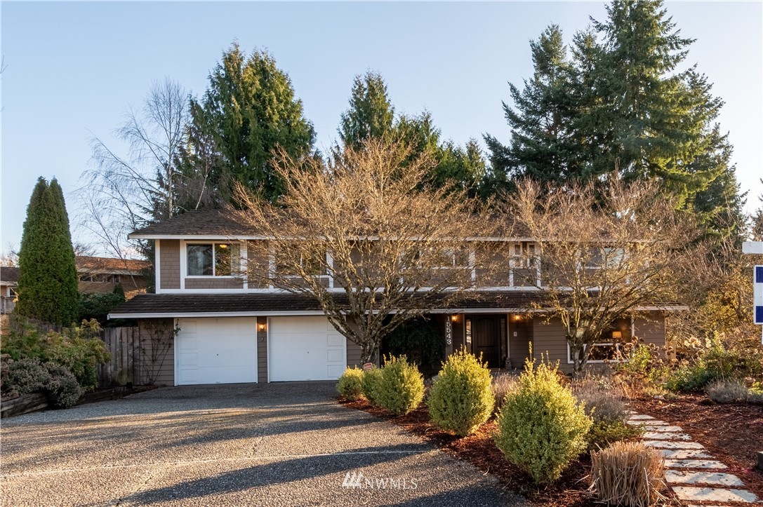 15543 Southeast 169th Street Renton, WA 98058 - Photo 1 of 35 a view of a house with a yard