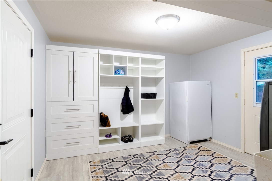 15543 Southeast 169th Street Renton, WA 98058 - Photo 14 of 35 a view of walk in closet with empty racks